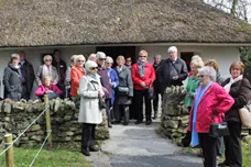 Lullymore Tour Group at Emigration Cottage